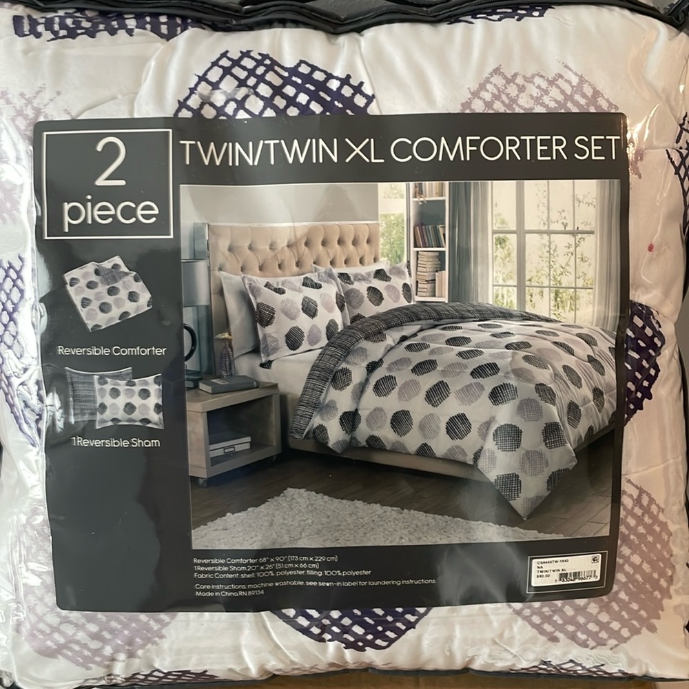 Comforter set reversible twin XL. Brand new w/tag in bag. White/dark&lightpurple
